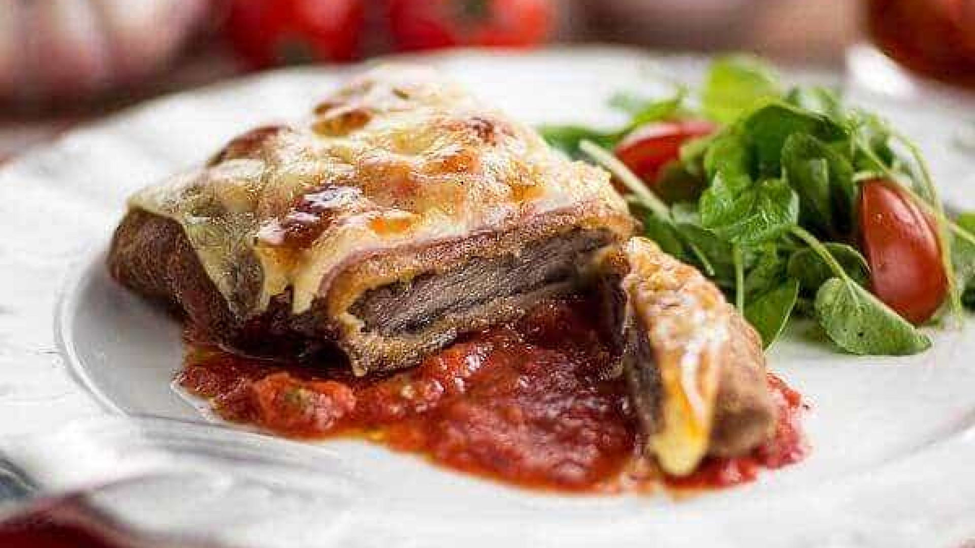 Aprenda a fazer bife à parmegiana
de forno e arrase no almoço